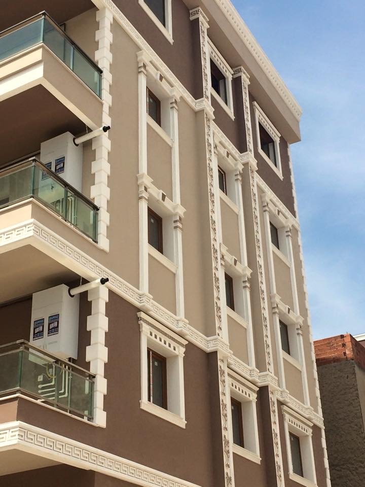 Clients satisfaits de revêtement mural au Cameroun